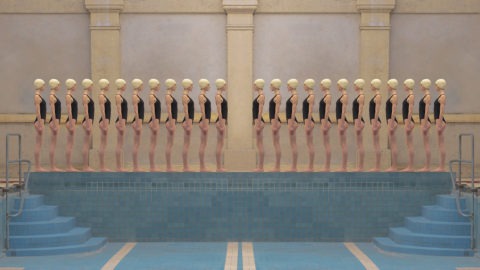 identical swimmers standing in a line