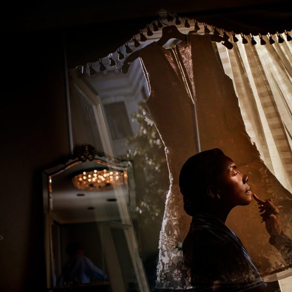 03-artistic-photo-of-bride-getting-makeup-done-by-destination-wedding-photographers-chrisman-studios