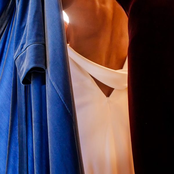 08-artistic-photo-of-bride-putting-gown-on-in-new-orleans-by-chrisman-studios